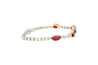 5.54 Carat Oval Cut Ruby and Diamond Tennis Bracelet in Two Tone 18K Gold