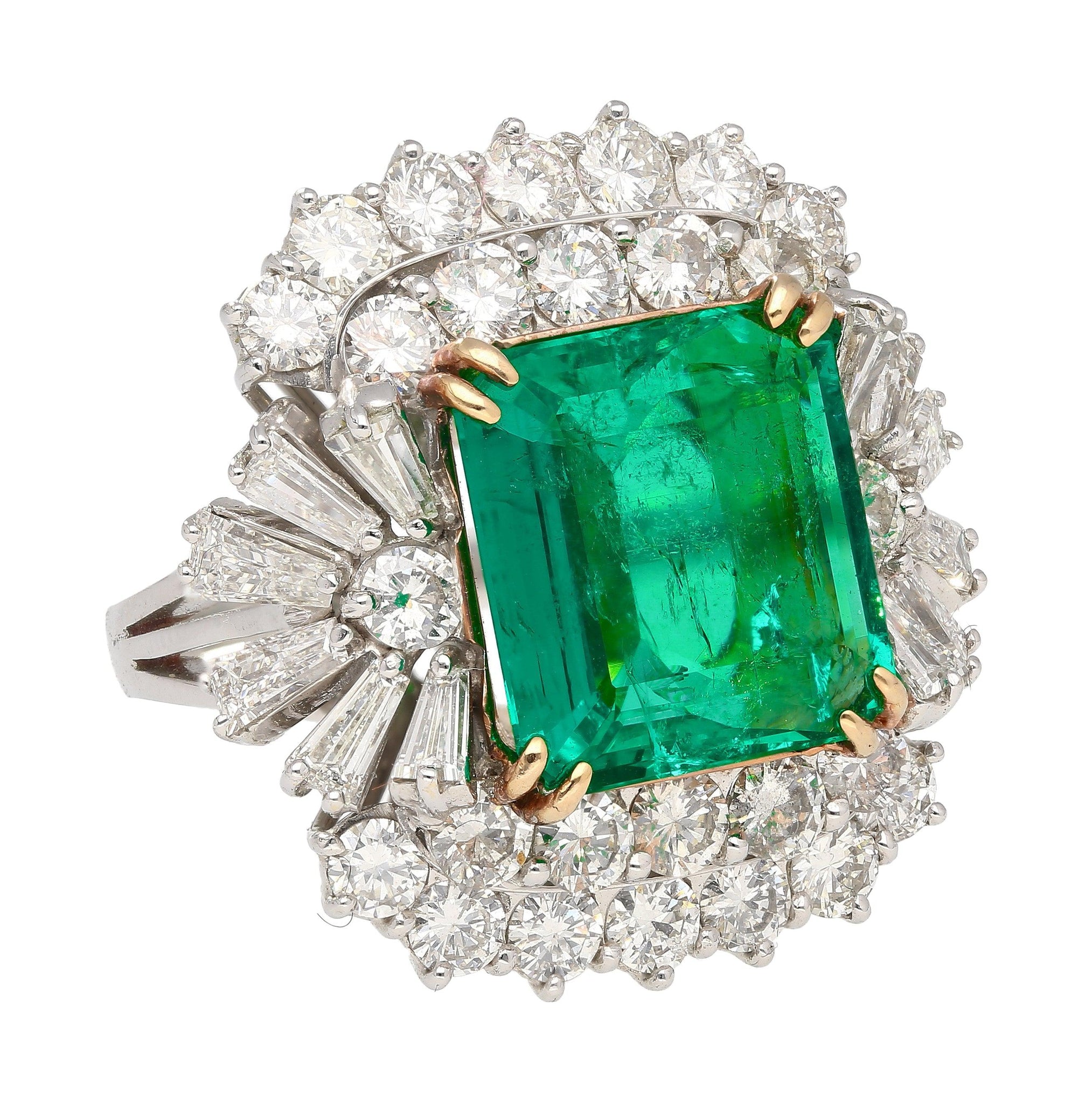 6.26 Carat Emerald Cut Emerald with Trillion and Round Cut Diamond Side Stone Ring in 18K White, Yellow Gold