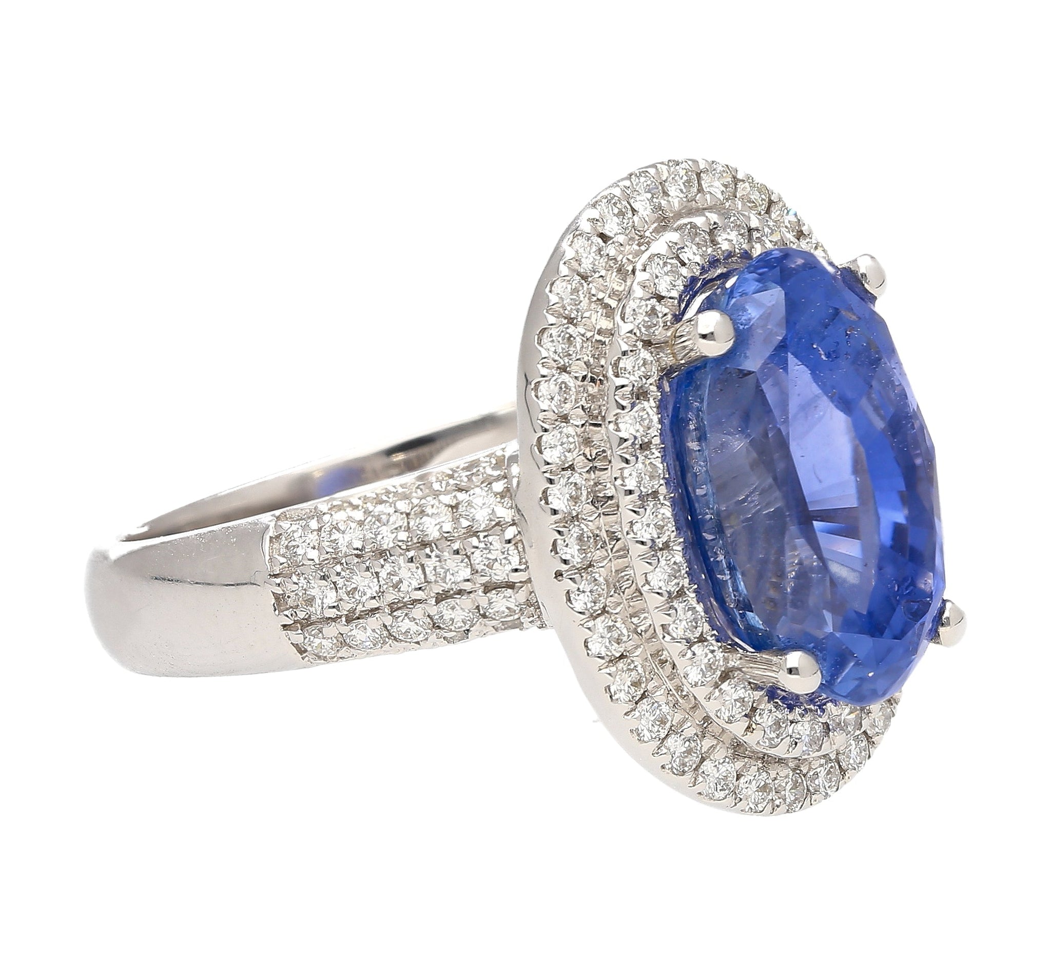 6.34 Carat No Heat Oval Cut Blue Sapphire and Diamond Halo 18K Ring GRS Certified