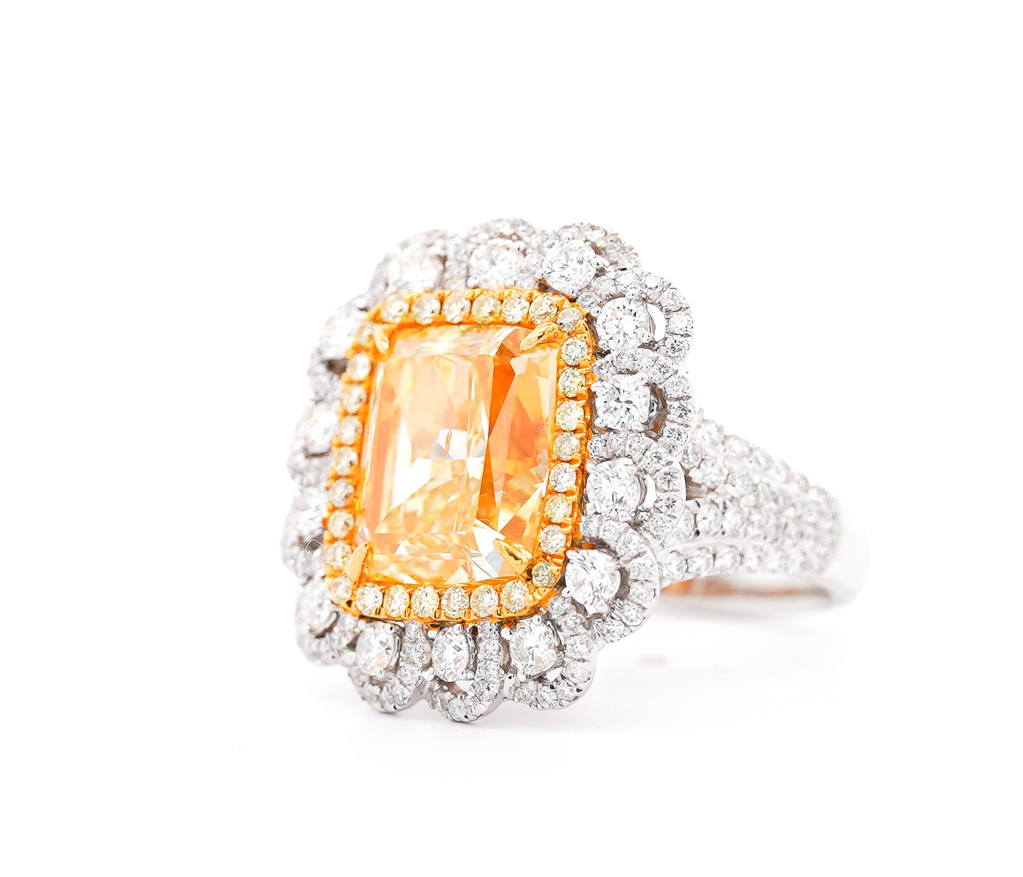 7 Carat Fancy Intense Yellow Radiant Cut Diamond and Diamond Halo Ring | GIA Certified