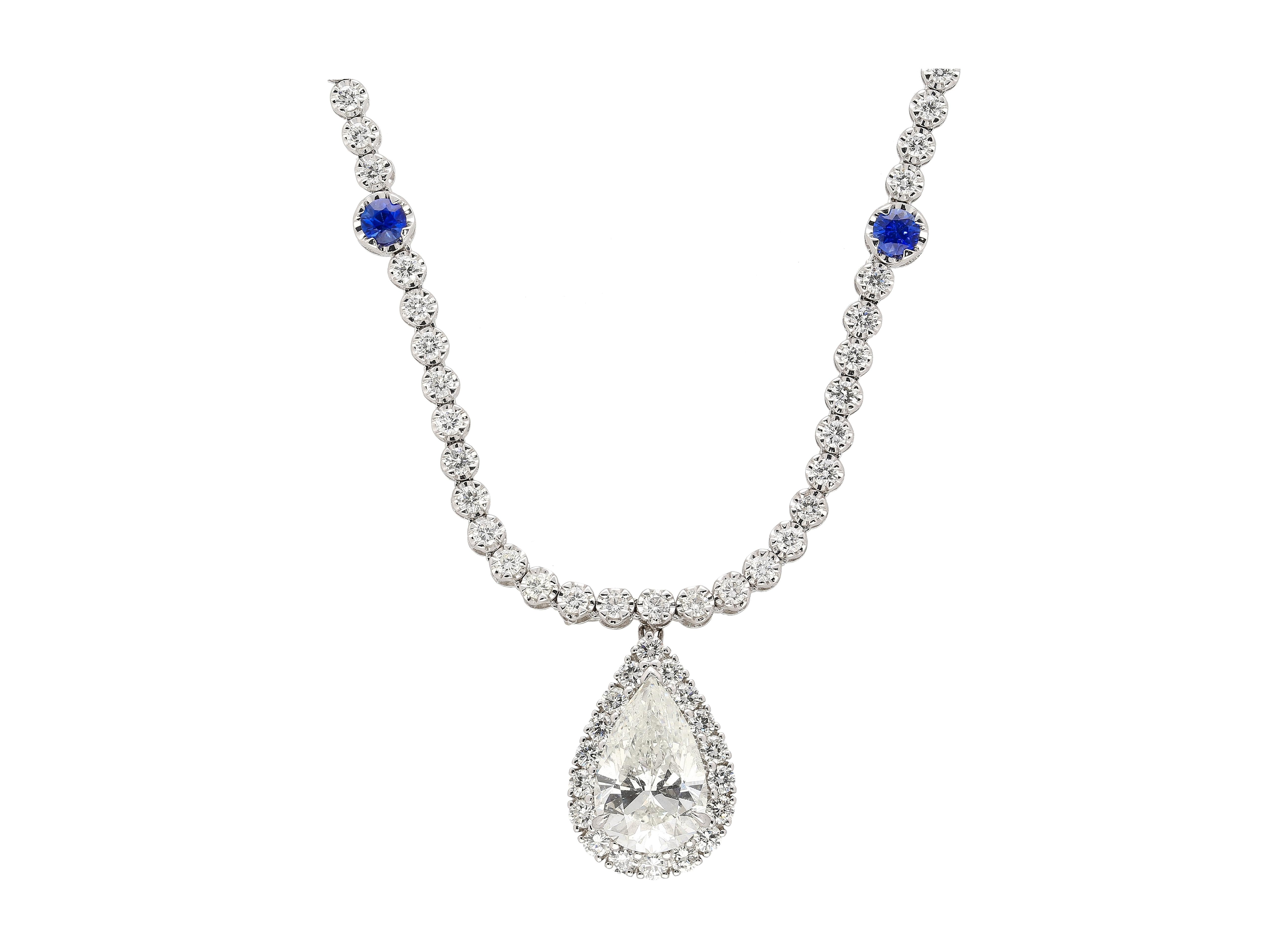 EGL Certified 5.02 Carat Pear Diamond Pendant and Diamond Halo & Sapphire Detail