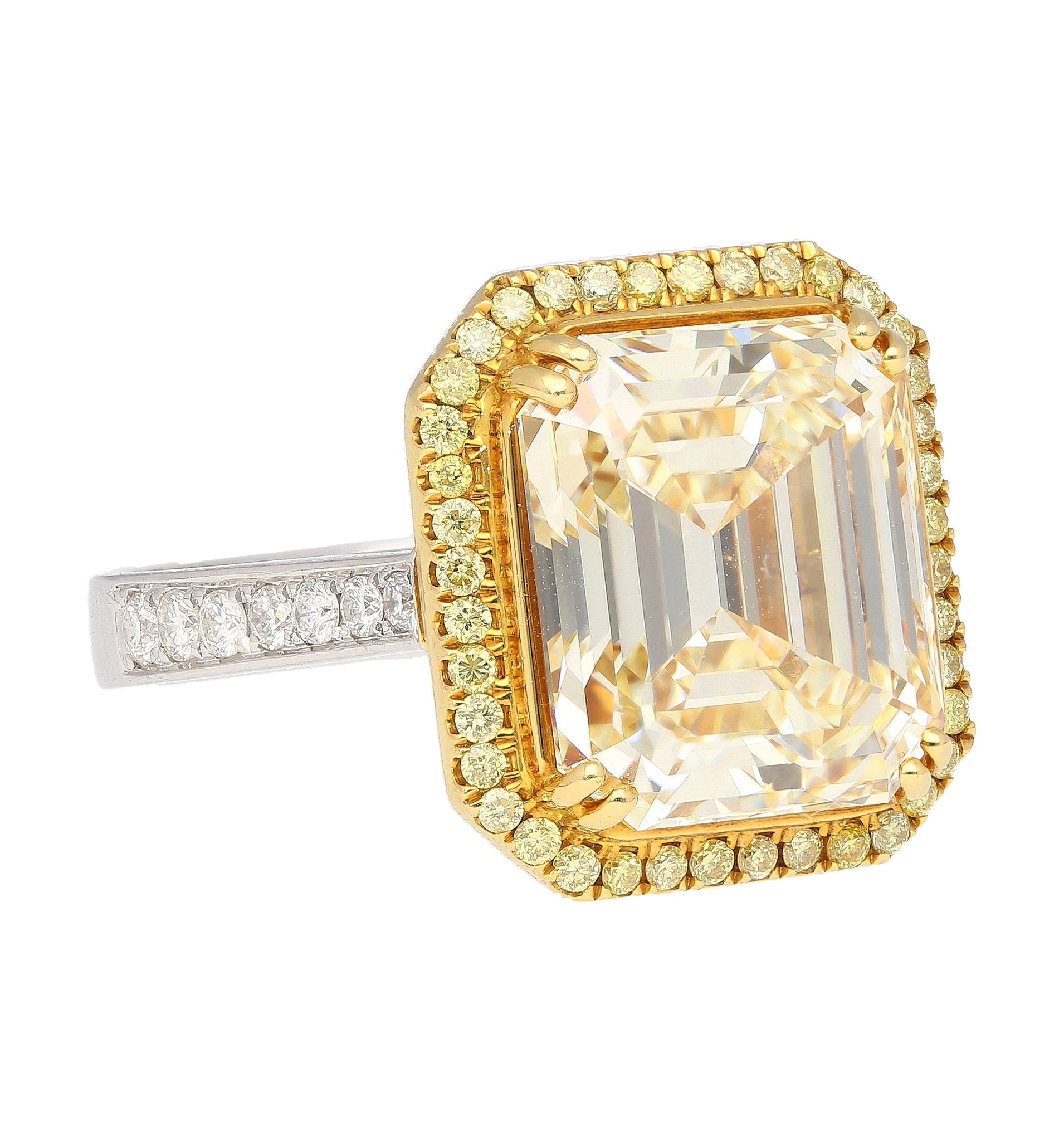 Emerald Cut Natural 7.25 Carat Fancy Light Yellow Diamond with Round Diamond Halo Ring