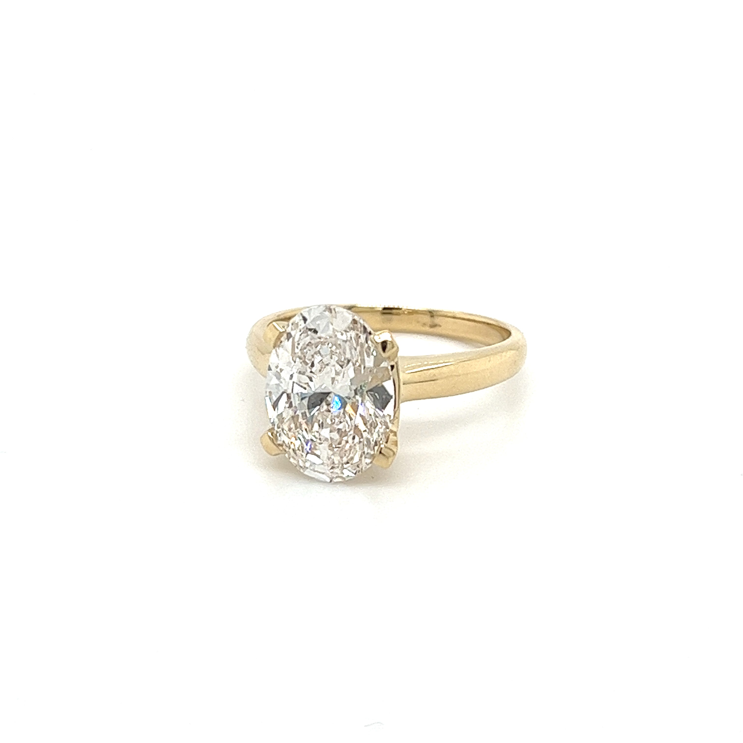 IGI-Certified-3_52-Carat-Oval-GVS1-Lab-Grown-Diamond-in-14k-Yellow-Gold-Solitaire-Ring-Rings.jpg
