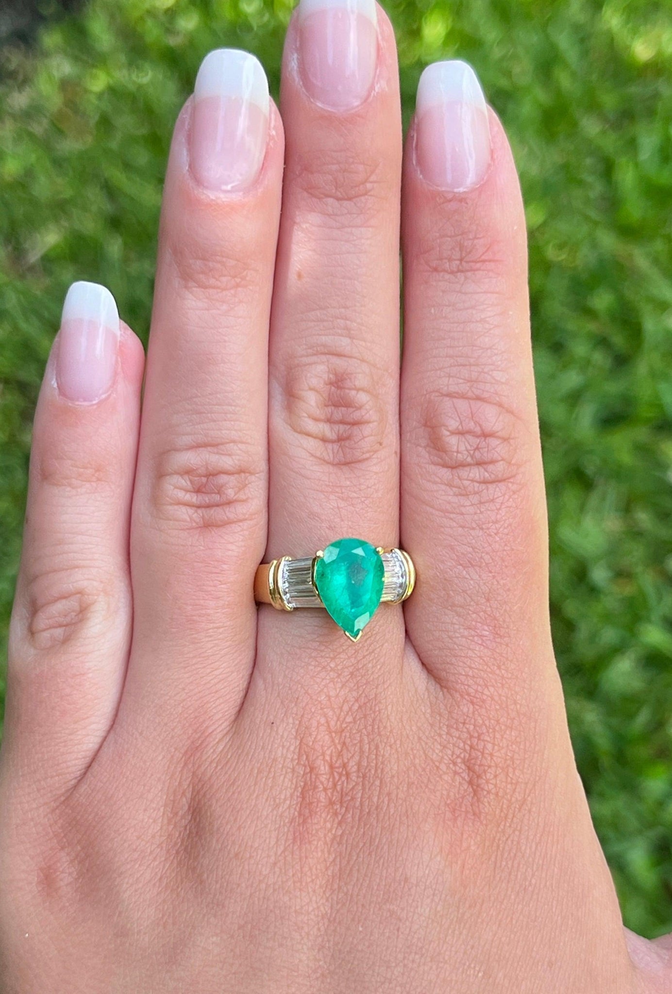 Natural 3.22 Carat Pear Cut Colombian Emerald With Baguette Diamond Side Stone Ring