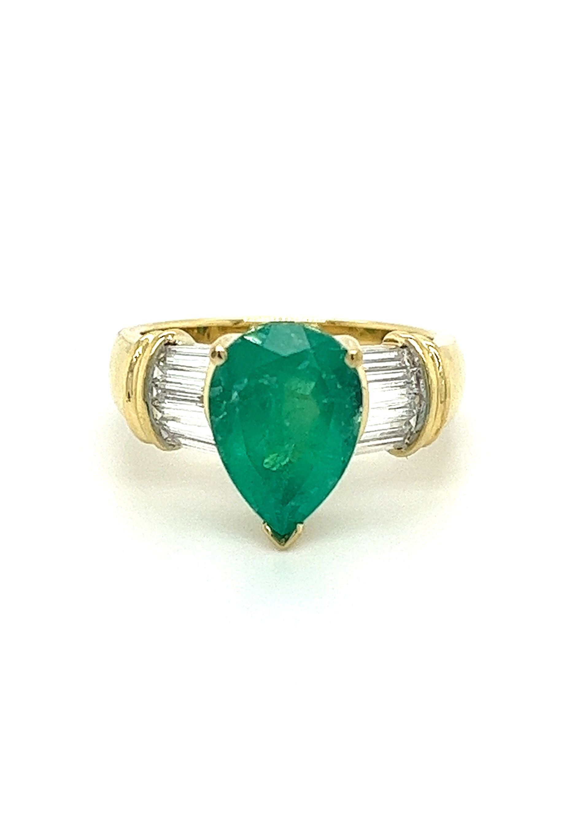 Natural-3_22-Carat-Pear-Cut-Colombian-Emerald-With-Baguette-Diamond-Side-Stone-Ring-Rings.jpg