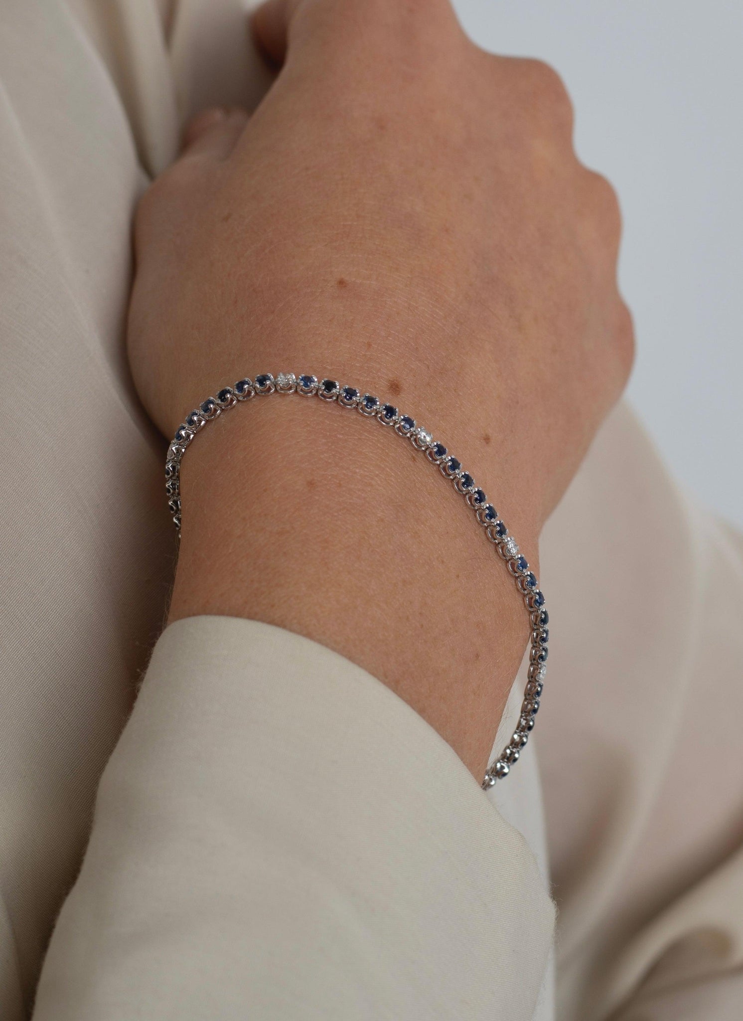 Round Cut Blue Sapphire & Diamond Prong Set Tennis Bracelet in 14K White Gold-Bracelets-ASSAY