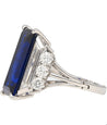 Vintage 8.56 carat Vivid Blue Sapphire and Trapezoid Diamond Ring in Platinum