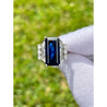 Vintage 8.56 carat Vivid Blue Sapphire and Trapezoid Diamond Ring in Platinum