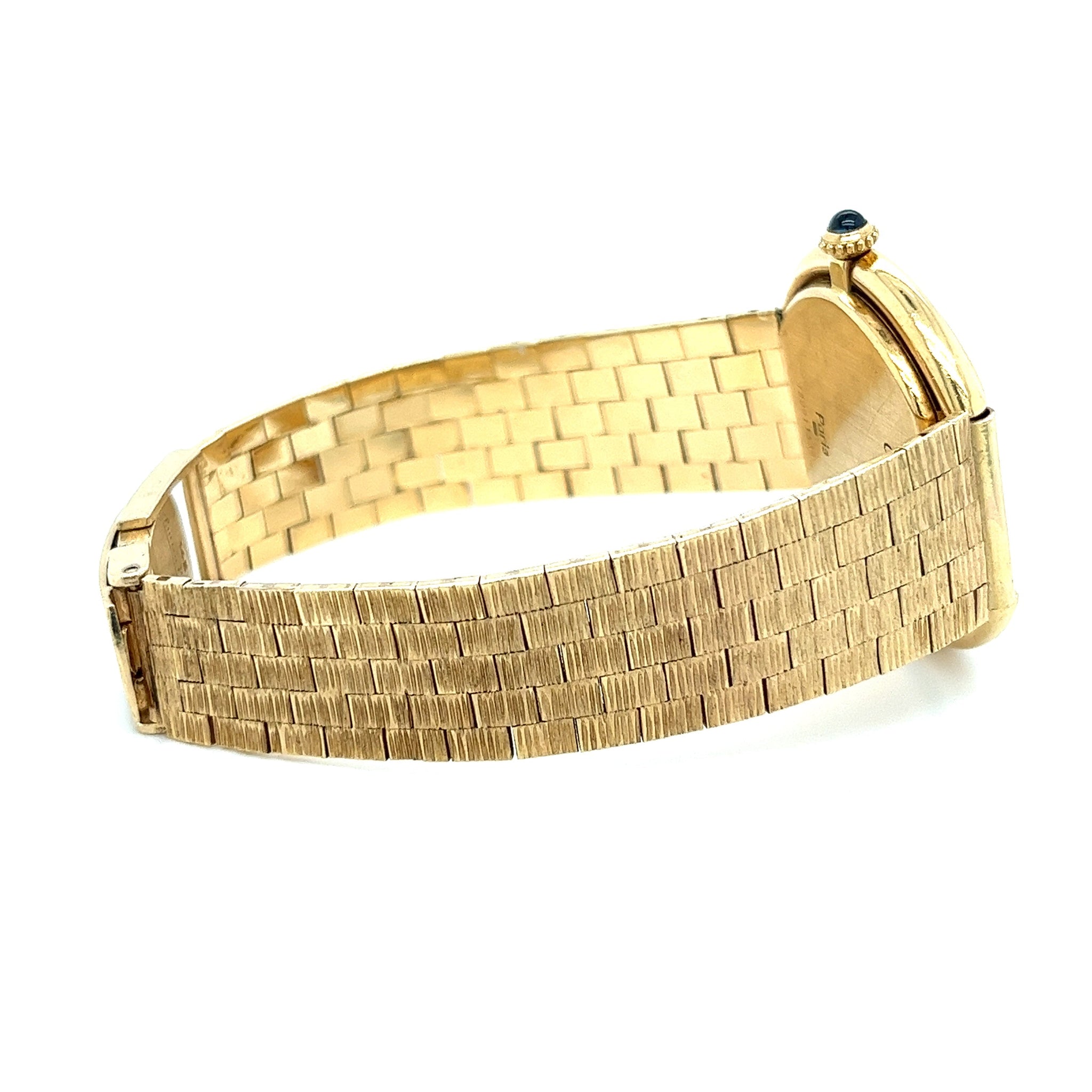 https://www.assayjewelers.com/cdn/shop/files/Vintage-Cartier-Paris-Manual-Wind-32MM-Dial-In-18K-Gold-Ladies-Watch-Watches-6_2048x.jpg?v=1699648708