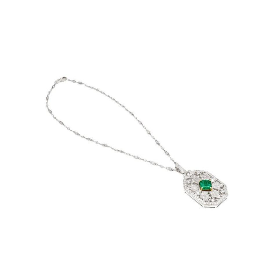 Vintage-Carved-Platinum-3_16-Carat-Vivid-Green-Minor-Oil-Emerald-Pendant-with-4-CTTW-in-Diamonds-Necklace-2.jpg