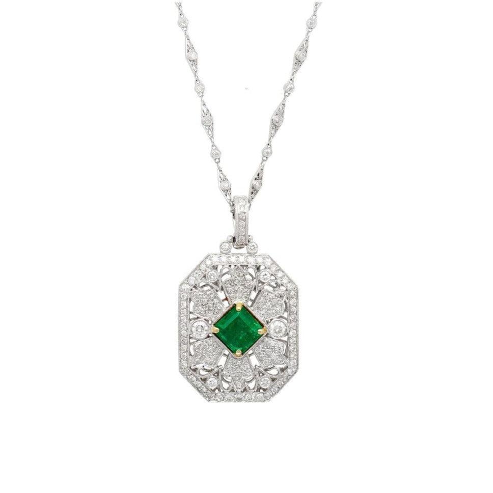 Vintage-Carved-Platinum-3_16-Carat-Vivid-Green-Minor-Oil-Emerald-Pendant-with-4-CTTW-in-Diamonds-Necklace.jpg