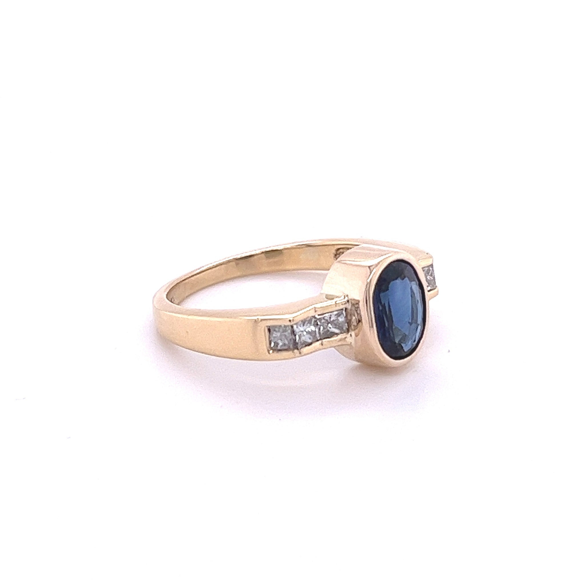 1.48 Carat Oval Cut Blue Sapphire With Princess Cut Diamond Ring in 18k Gold-Assay Jewelers-ASSAY