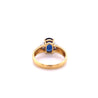 2.32 Carat Oval Cut Blue Sapphire with Trillion Cut Diamond Side stones in 18k Yellow Gold Ring-ASSAY-ASSAY