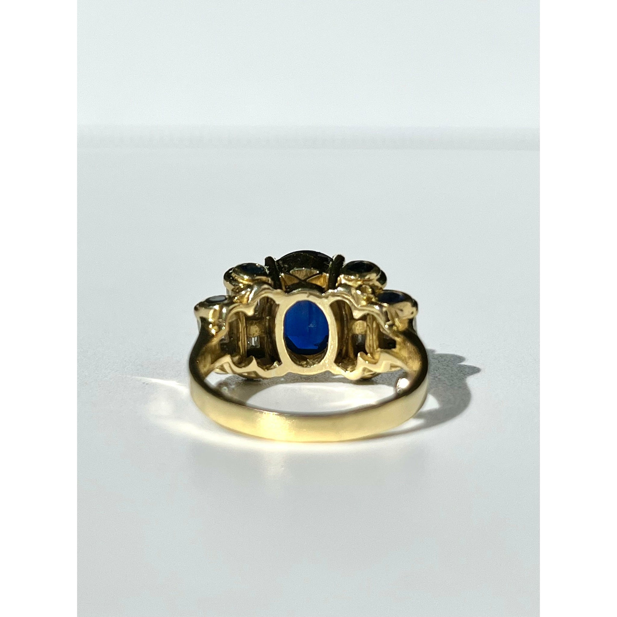 Retro Style Chanthaburi Blue Sapphire ring with Baguette Diamond Sidestones - ASSAY